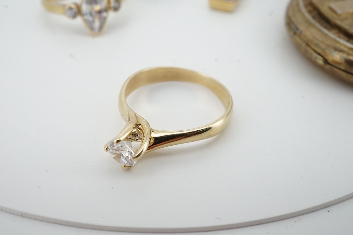 Two modern 9ct gold and cubic zirconia set rings, including white gold, two other simulated diamond set rings, together with an Italian cross pendant, a cameo brooch and an oval gilt metal locket.